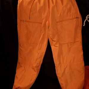 Orange parachute pants